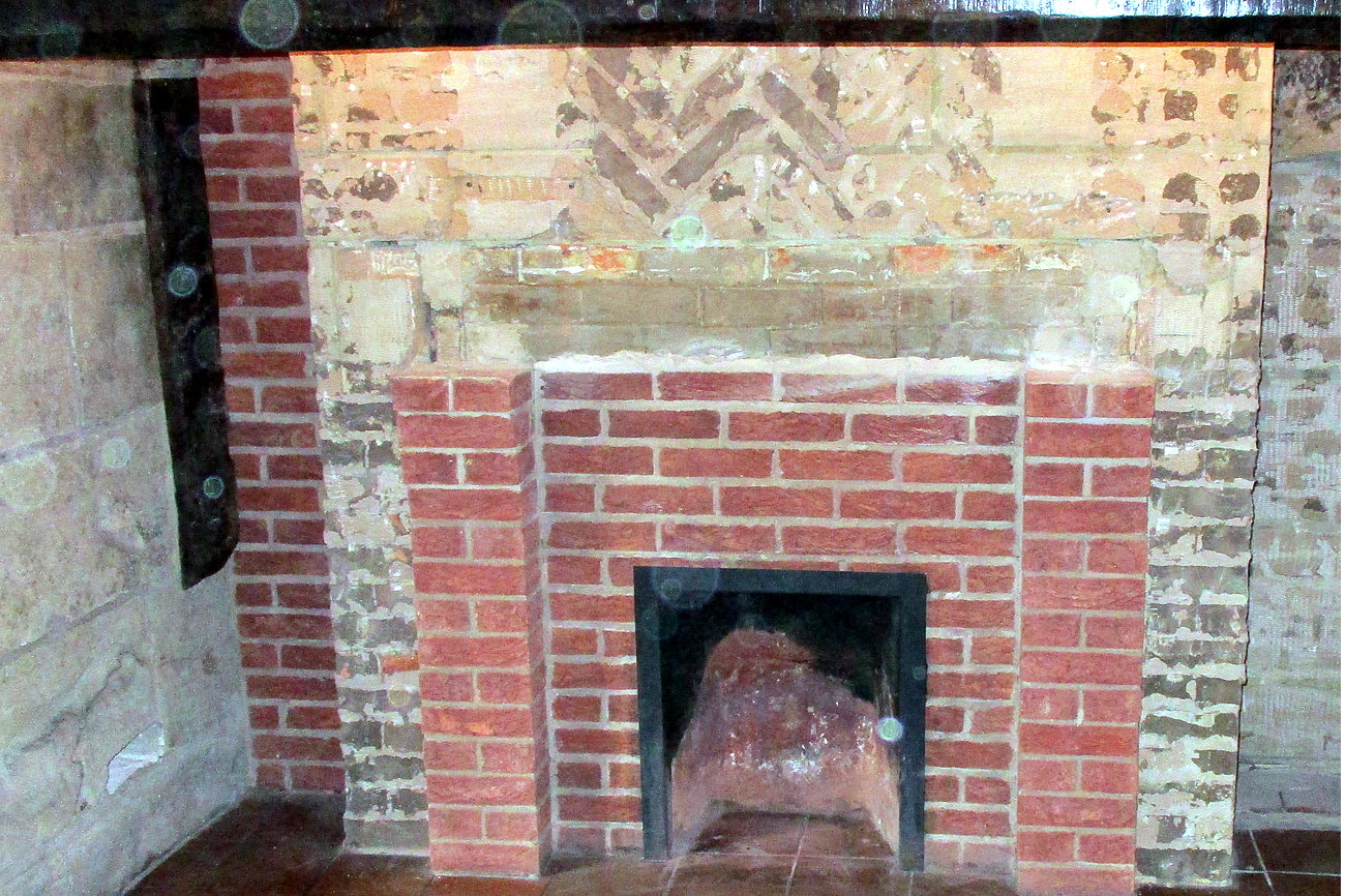 an old fireplace in need of renovation